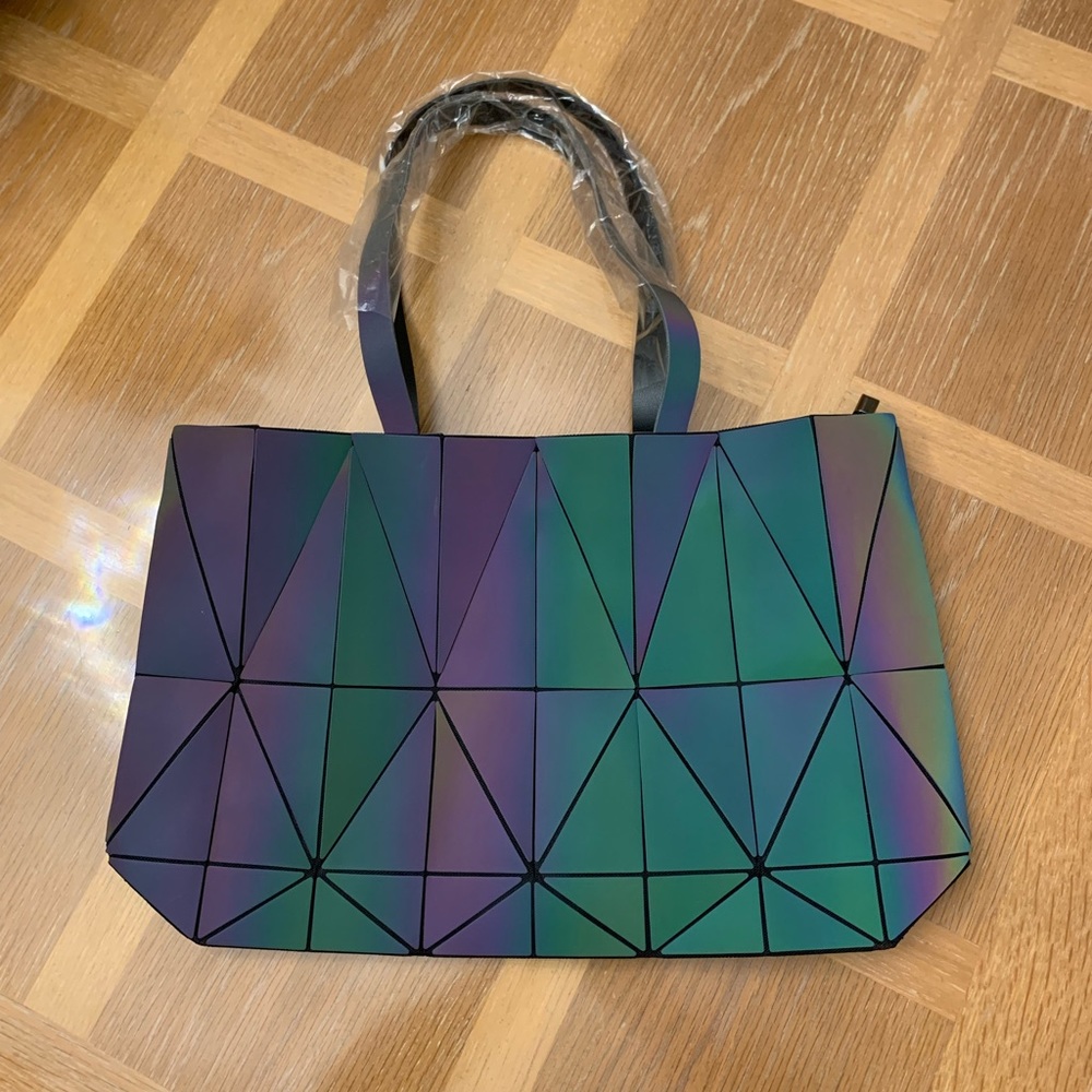 Brand new Luminesk tote 17” W x 10.75”H x 3.25” D